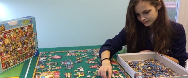 Pupil Ellie enjoys some quiet time in the school's wellbeing room